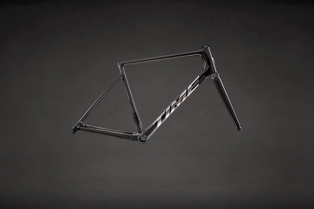 TIME FLUIDITY endurance road frameset in F01 Nude Carbon, natural carbon weave finish and integrated hidden seatpost clamp

