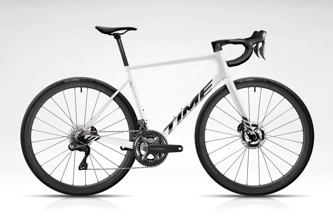 TIME Fluidity in S02 Gloss White on white background with LTD Edition Ultegra Power build kit, available this holiday season while supplies last. 
