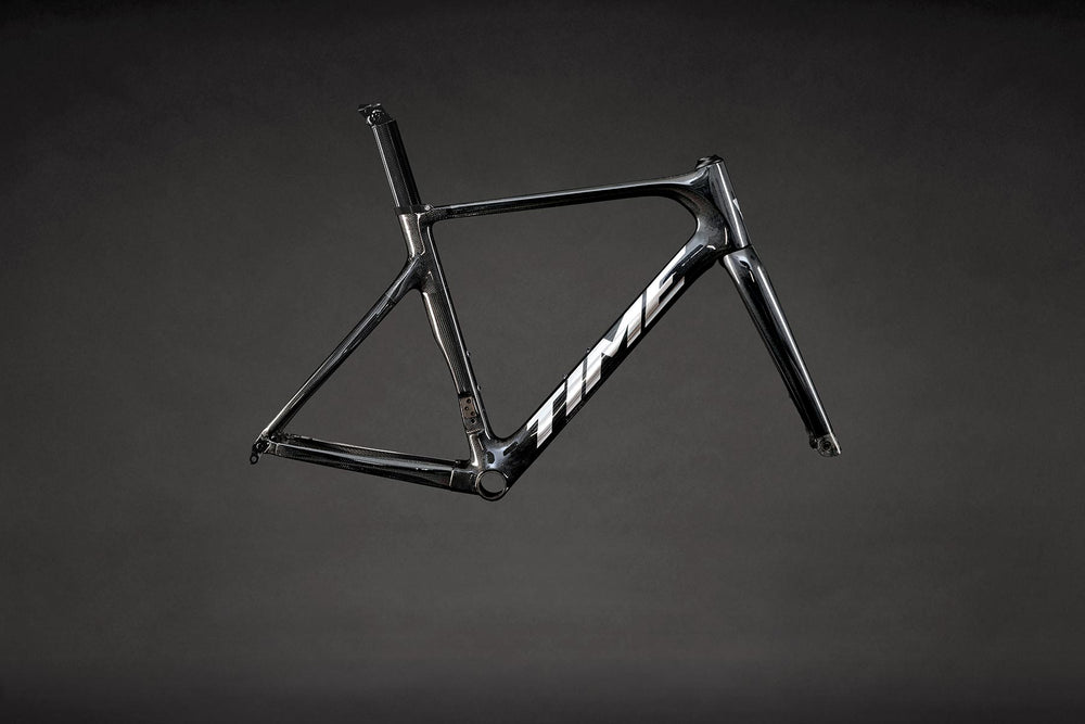 TIME SCYLON road frameset in S01 Carbon Fade colorway, showing full carbon fiber weave finish
